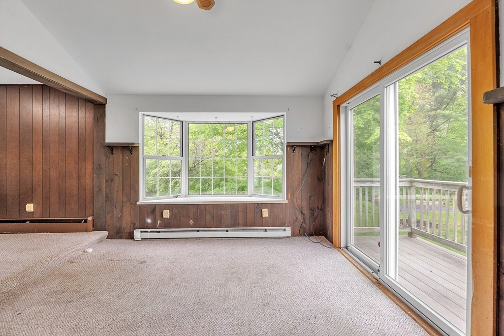 45 Alpine Drive Southbridge, MA 01550 - Photo 11 of 35 a view of an empty room with wooden floor and windows