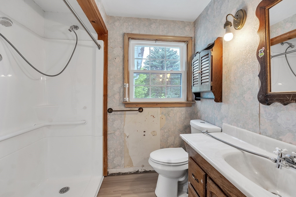 45 Alpine Drive Southbridge, MA 01550 - Photo 15 of 35 a bathroom with a sink a toilet and a mirror