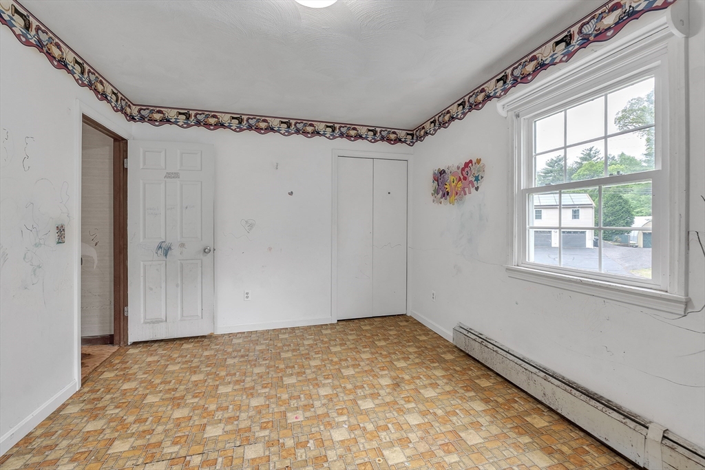 45 Alpine Drive Southbridge, MA 01550 - Photo 20 of 35 a view of a room with rack on the wall and a window