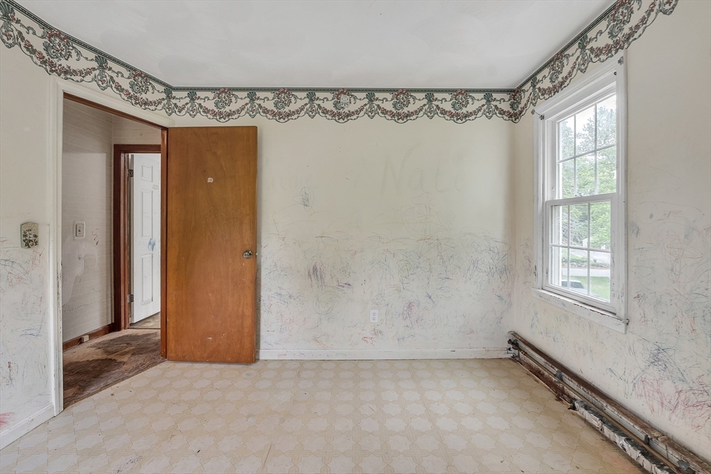 45 Alpine Drive Southbridge, MA 01550 - Photo 22 of 35 an empty room with a windows and a dresser