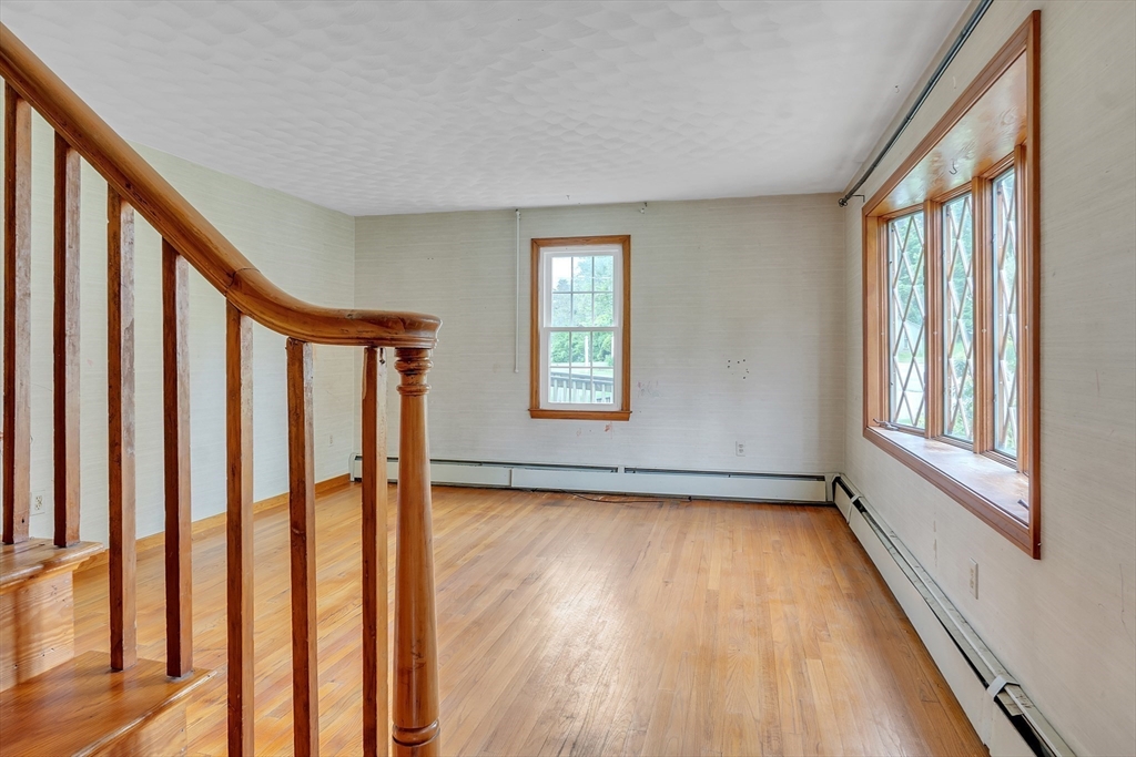 45 Alpine Drive Southbridge, MA 01550 - Photo 7 of 35 a view of an empty room with wooden floor and a window