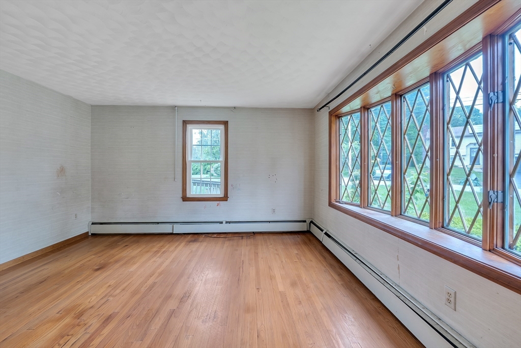 45 Alpine Drive Southbridge, MA 01550 - Photo 9 of 35 a view of an empty room and wooden floor and a window