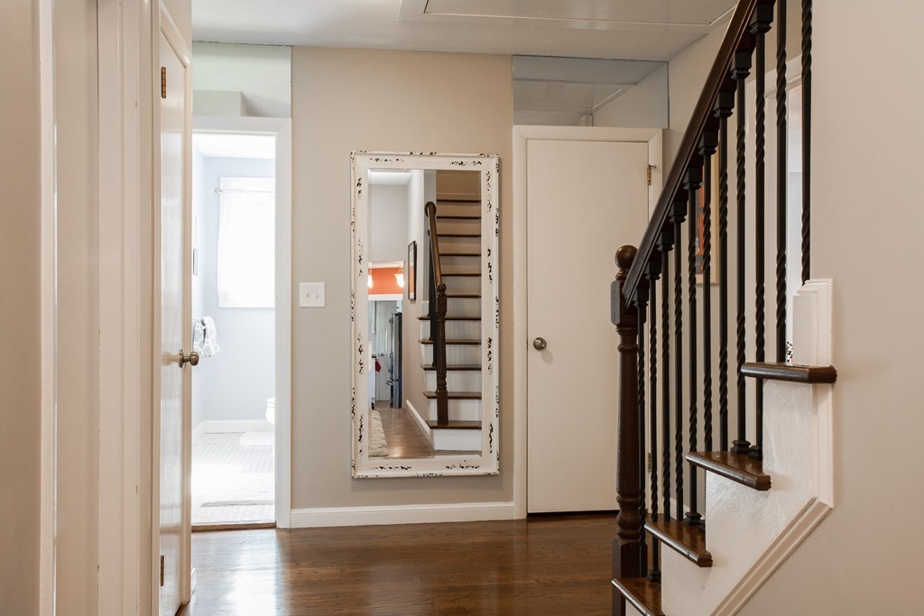 566 Newton Street Brookline, MA 02467 - Photo 13 of 30 a view of a hallway with wooden floor and entryway