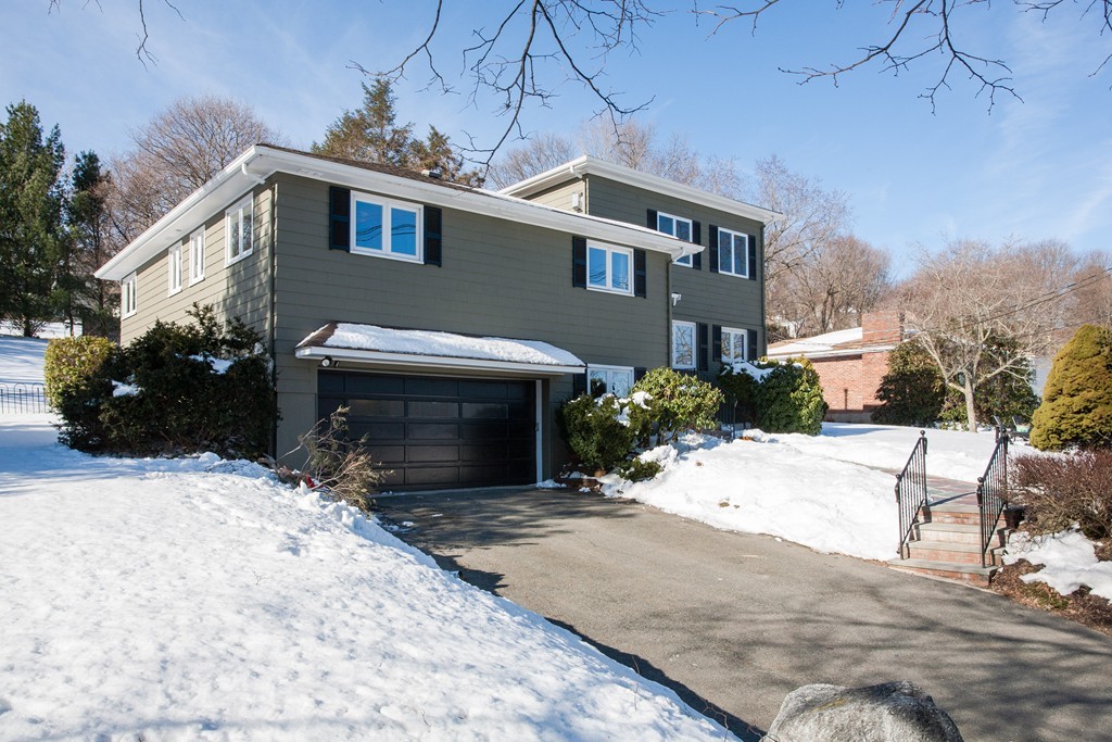 566 Newton Street Brookline, MA 02467 - Photo 29 of 30 a view of a house with a patio