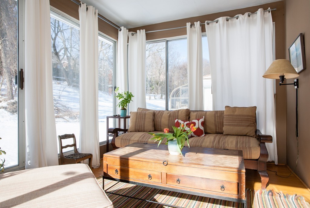 566 Newton Street Brookline, MA 02467 - Photo 8 of 30 a living room with furniture and a potted plant