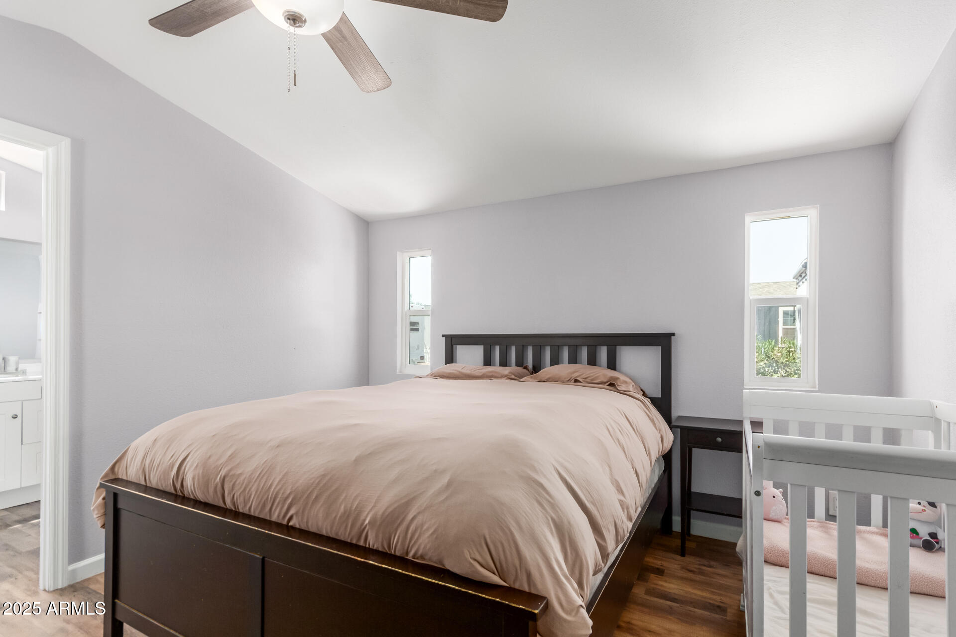 320 East McKellips Road, Unit 188 Mesa, AZ 85201 - Photo 17 of 28 a bedroom with a bed and a window