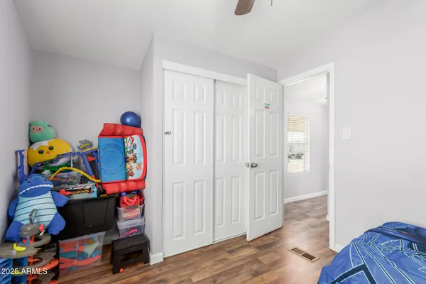 a room with toys and wooden floor