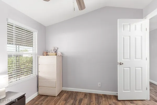 a view of washer and dryer with wooden floor