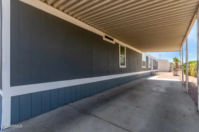 a view of backyard with seating space