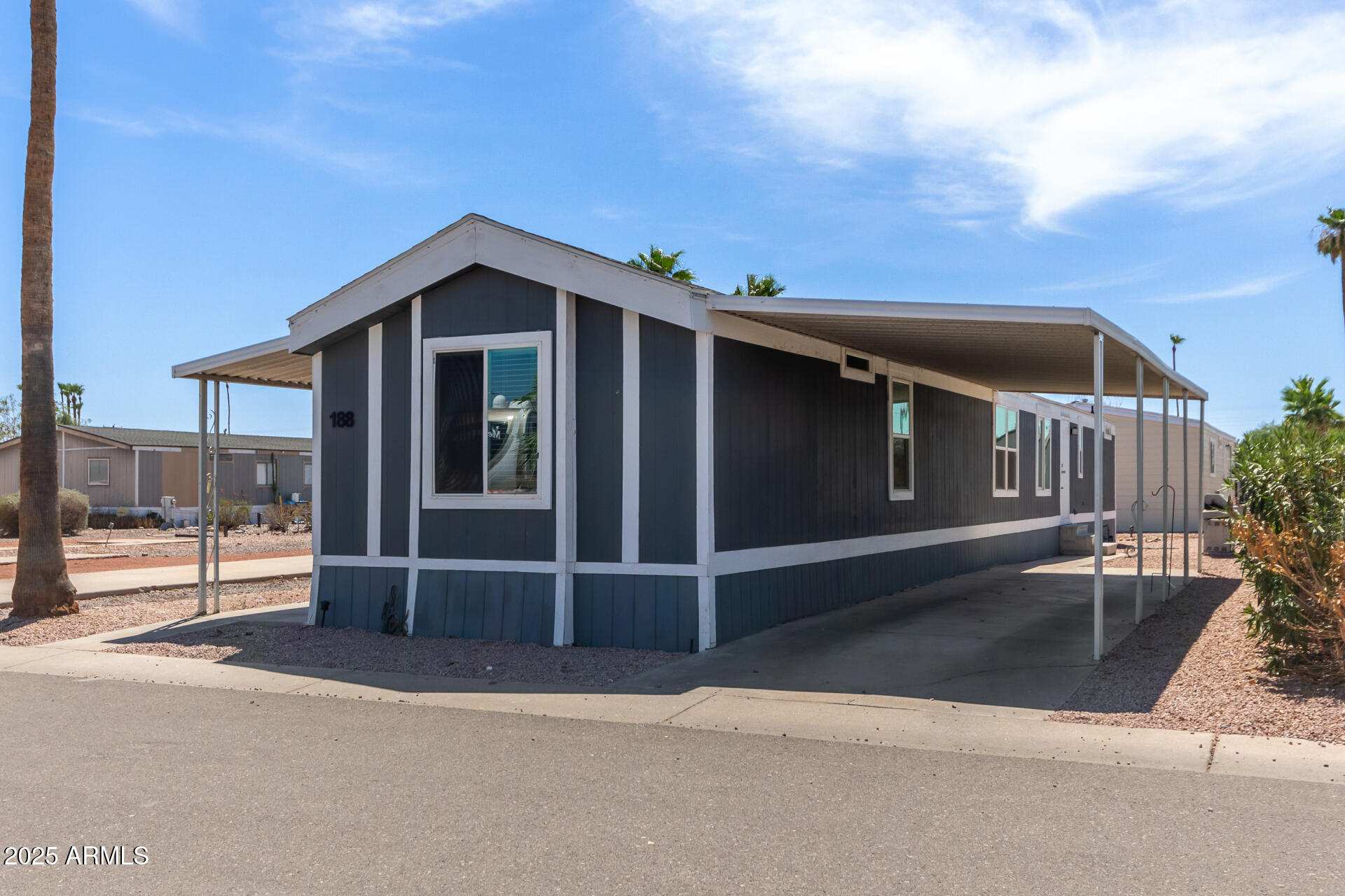 320 East McKellips Road, Unit 188 Mesa, AZ 85201 - Photo 6 of 28 a view of backyard with cabin