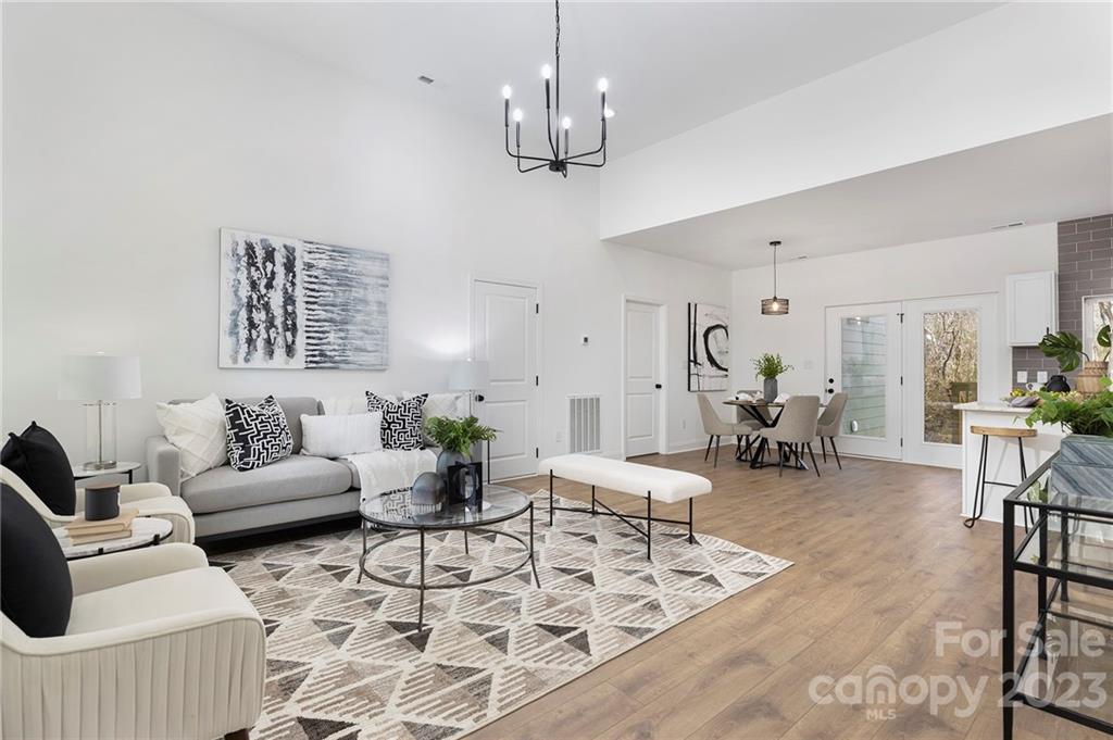 20 Rose Street York, SC 29745 - Photo 1 of 22 a living room with furniture and a chandelier