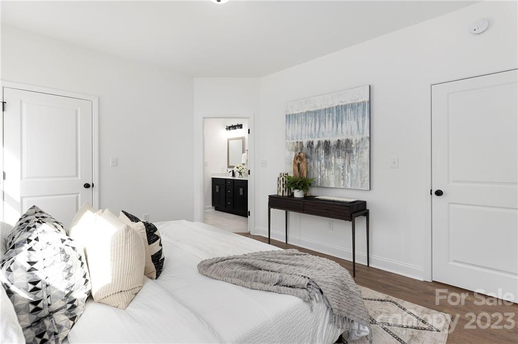 20 Rose Street York, SC 29745 - Photo 11 of 22 a bedroom with a bed and a table in it