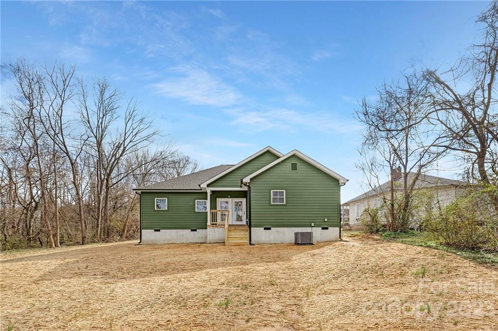 20 Rose Street York, SC 29745 - Photo 20 of 22 a front view of a house with a yard and garage