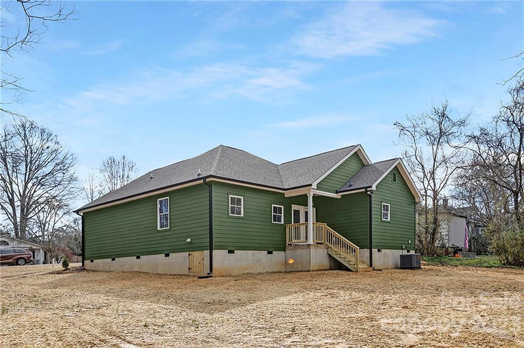 20 Rose Street York, SC 29745 - Photo 21 of 22 a view of a house with a yard and garage