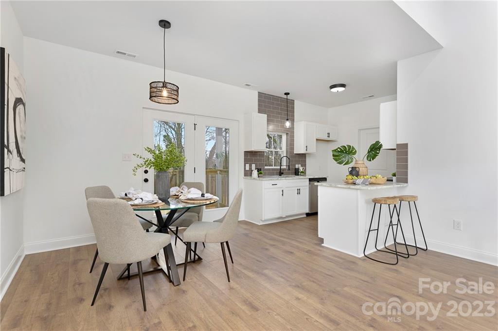 20 Rose Street York, SC 29745 - Photo 4 of 22 a view of a dining room with furniture and wooden floor