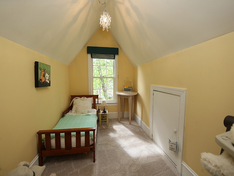 2804 Royster Street Raleigh, NC 27608 - Photo 12 of 20 Off of the second bedroom. What a cute reading nook! A curtain can hang on a tension rod to give it a fun "hidden away" feeling. Flex space