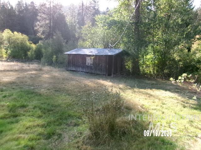 31997 2nd Fork Road Ola, ID 83657 - Photo 34 of 47 Wood-sided outbuilding with a corrugated roof