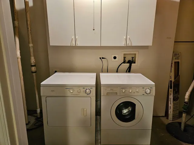 a view of a chairs and table in the patio