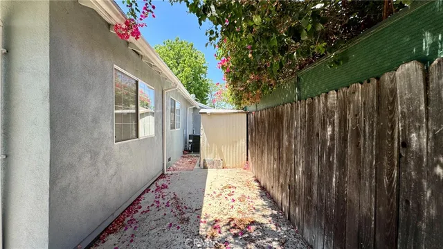 a view of backyard with green space
