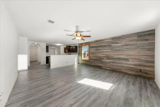 a view of livingroom and hardwood floor