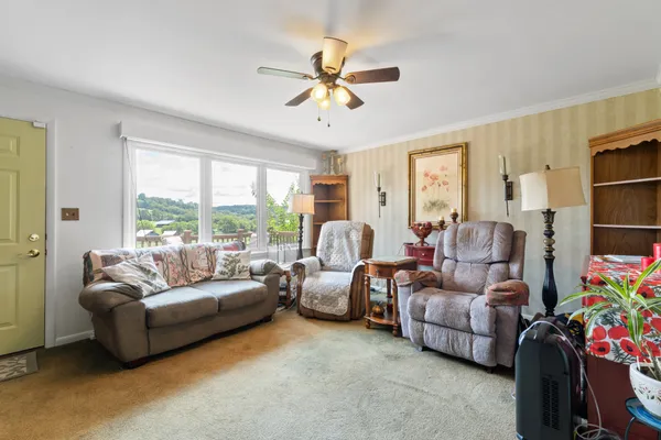 a living room with furniture and a window
