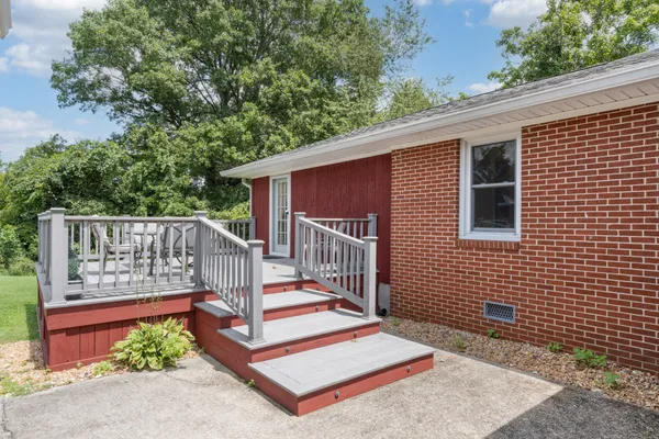 an aerial view of a house with a garden