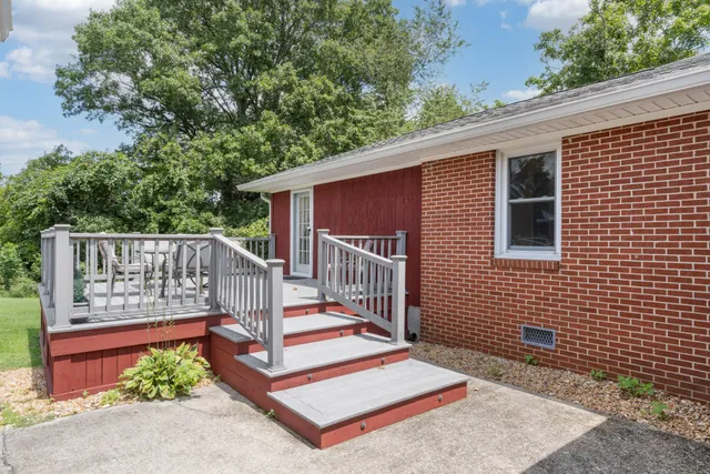 an aerial view of a house with a garden