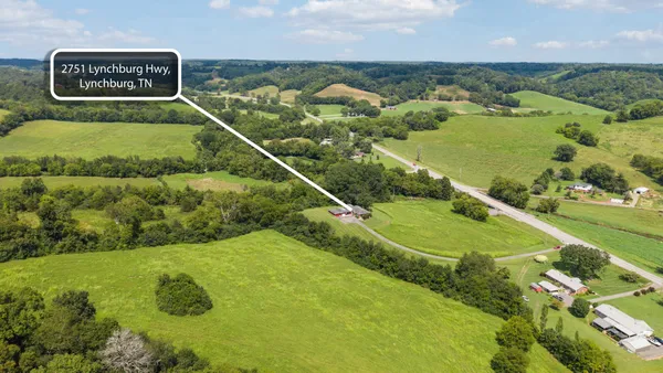 a view of a city with mountains in the background