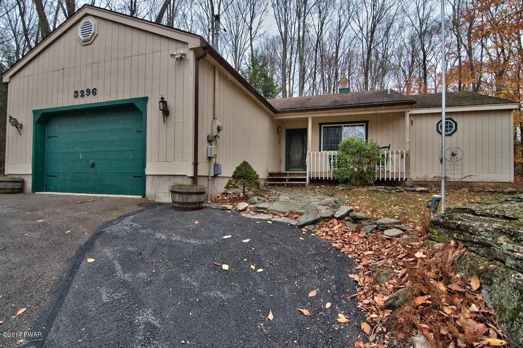 3296 Northgate Road Lake Ariel, PA 18436 - Photo 1 of 33 a view of a house with backyard and garden