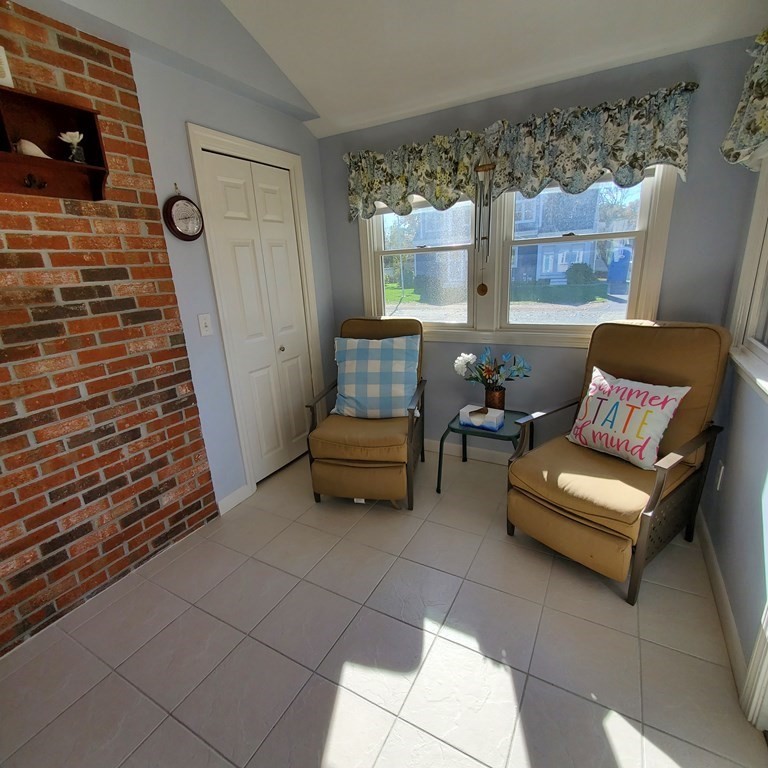 45 Nipigon Way West Dennis, MA 02639 - Photo 21 of 42 a living room with furniture and a flat screen tv