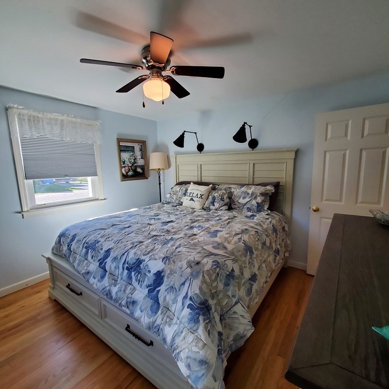 45 Nipigon Way West Dennis, MA 02639 - Photo 25 of 42 a bedroom with a bed and window