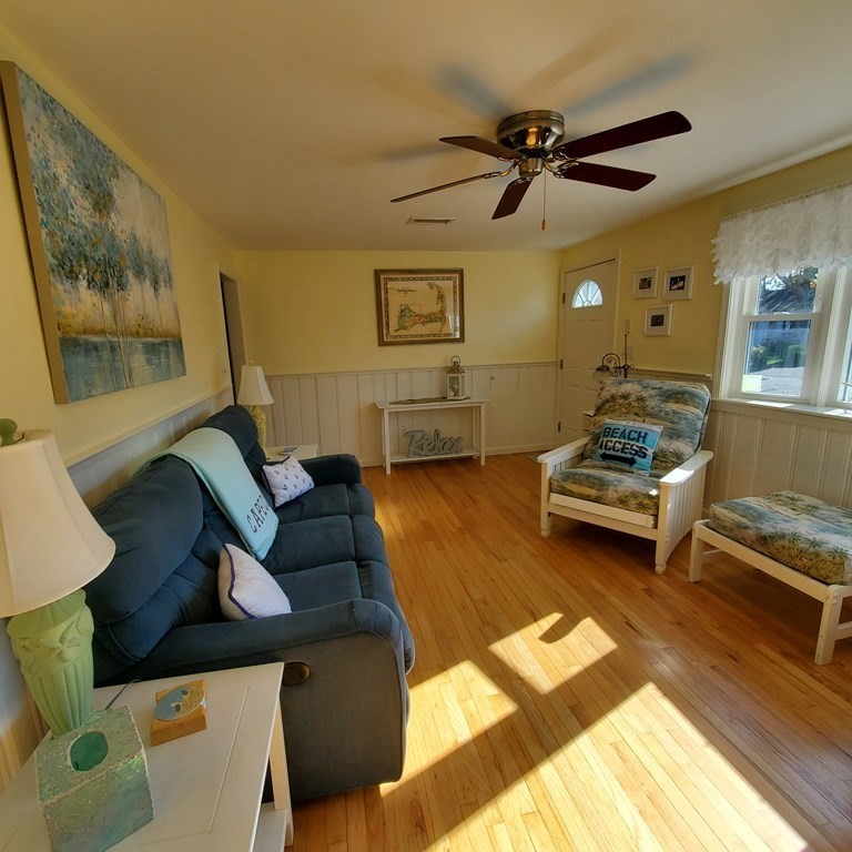 45 Nipigon Way West Dennis, MA 02639 - Photo 10 of 42 a living room with furniture and a rug