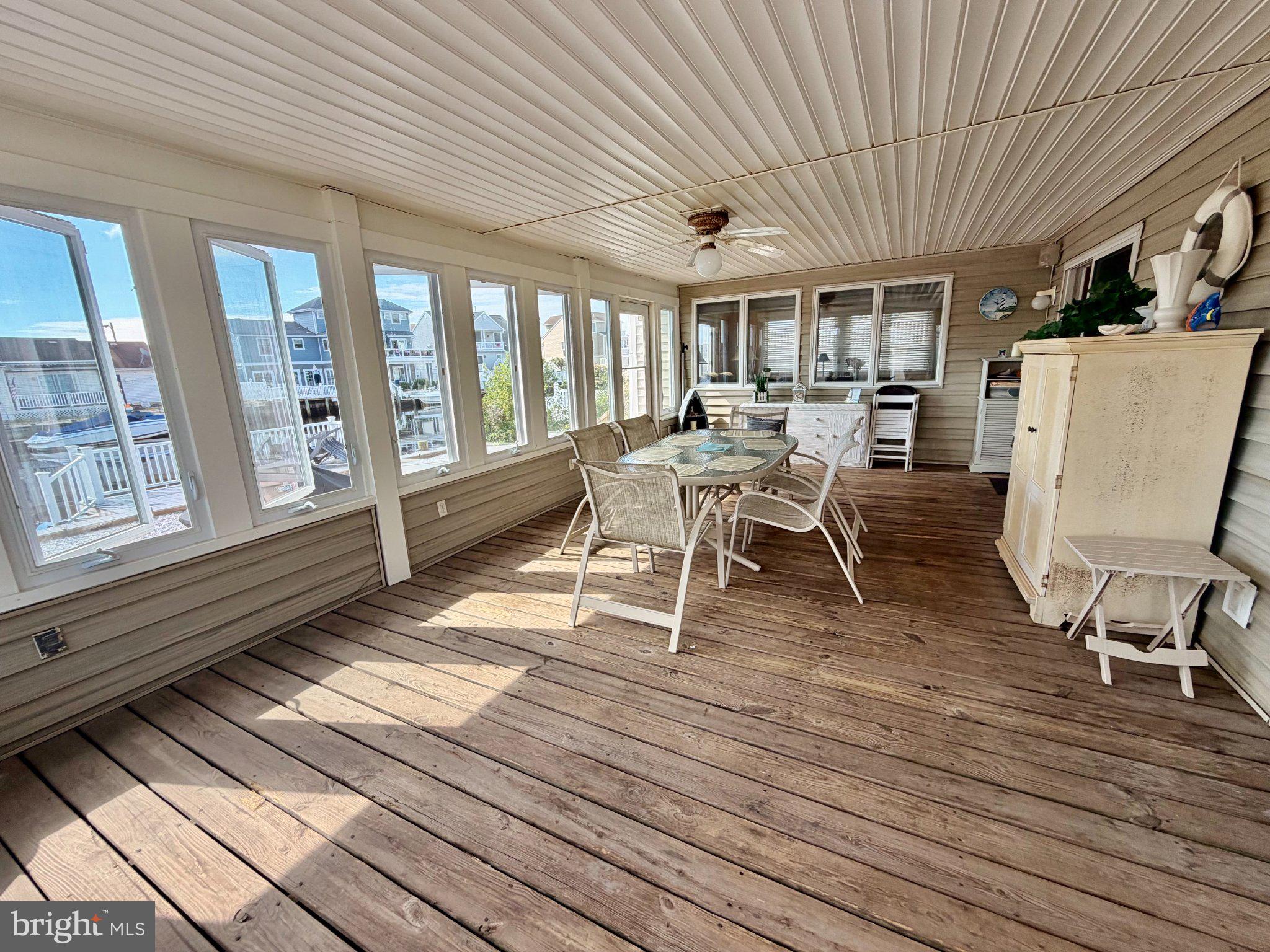 211 William Cook Boulevard Manahawkin, NJ 08050 - Photo 27 of 71 Bright and airy sunroom retreat.