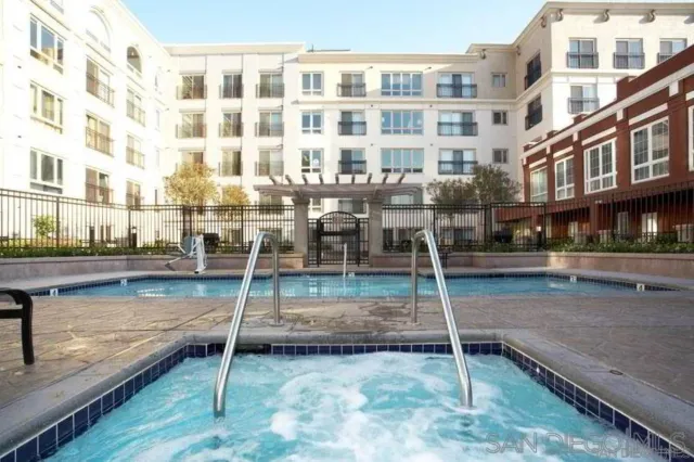 a view of a building with a street