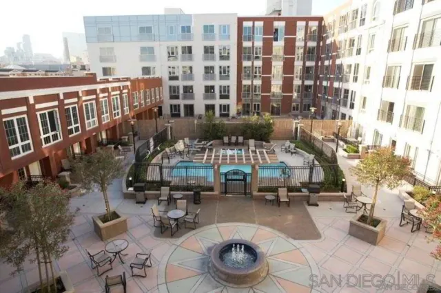 a view of a building with a swimming pool