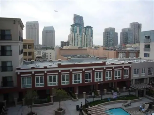 a view of a city with tall buildings