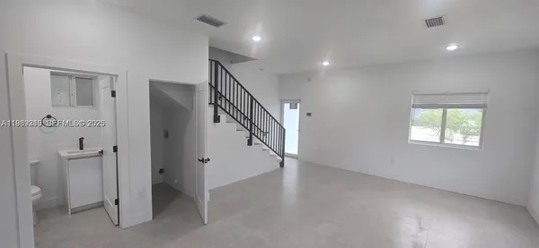 a view of an entryway with stairs