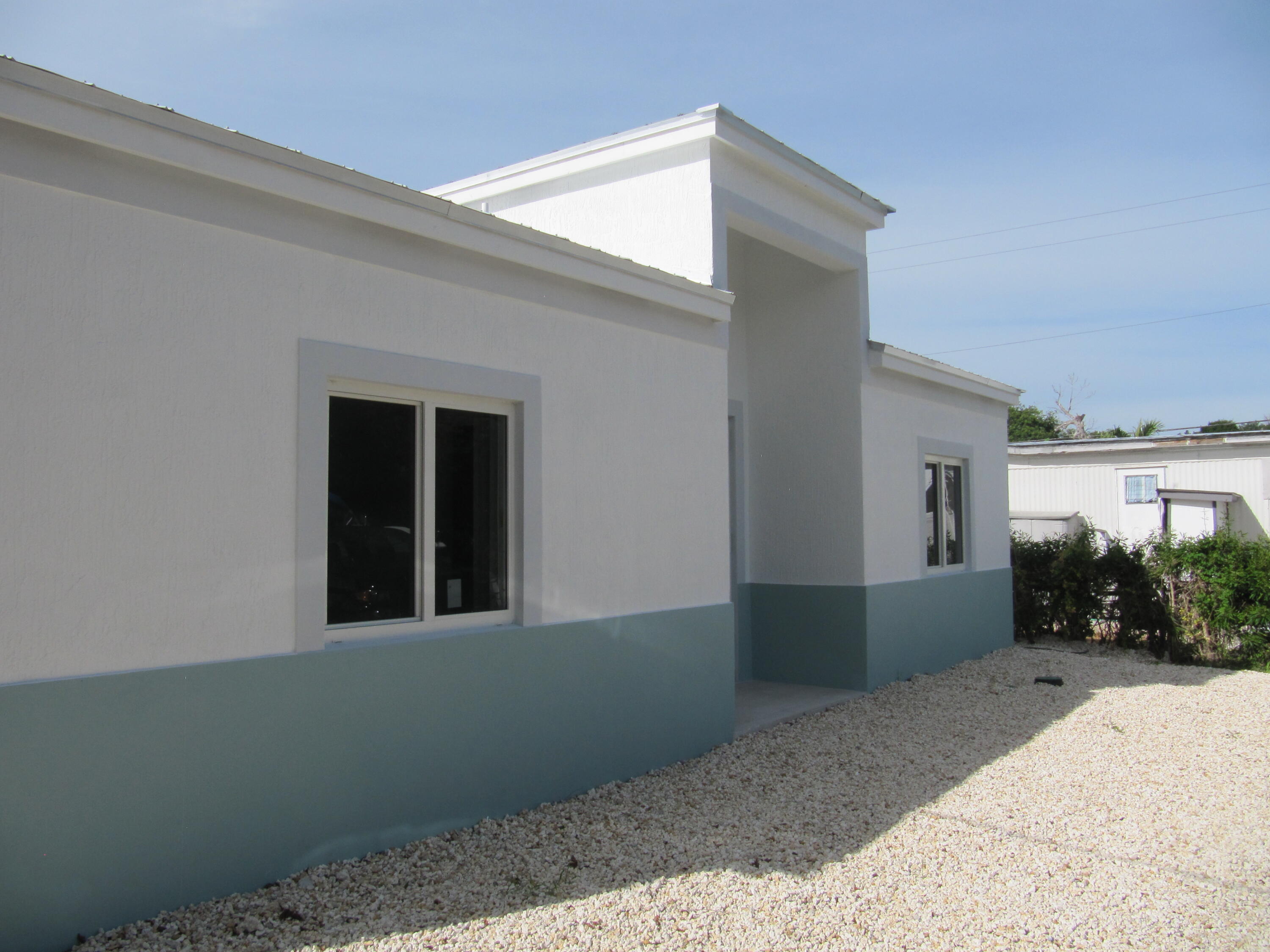 21 Tina Place Key Largo, FL 33037 - Photo 13 of 15 a view of a house with a yard