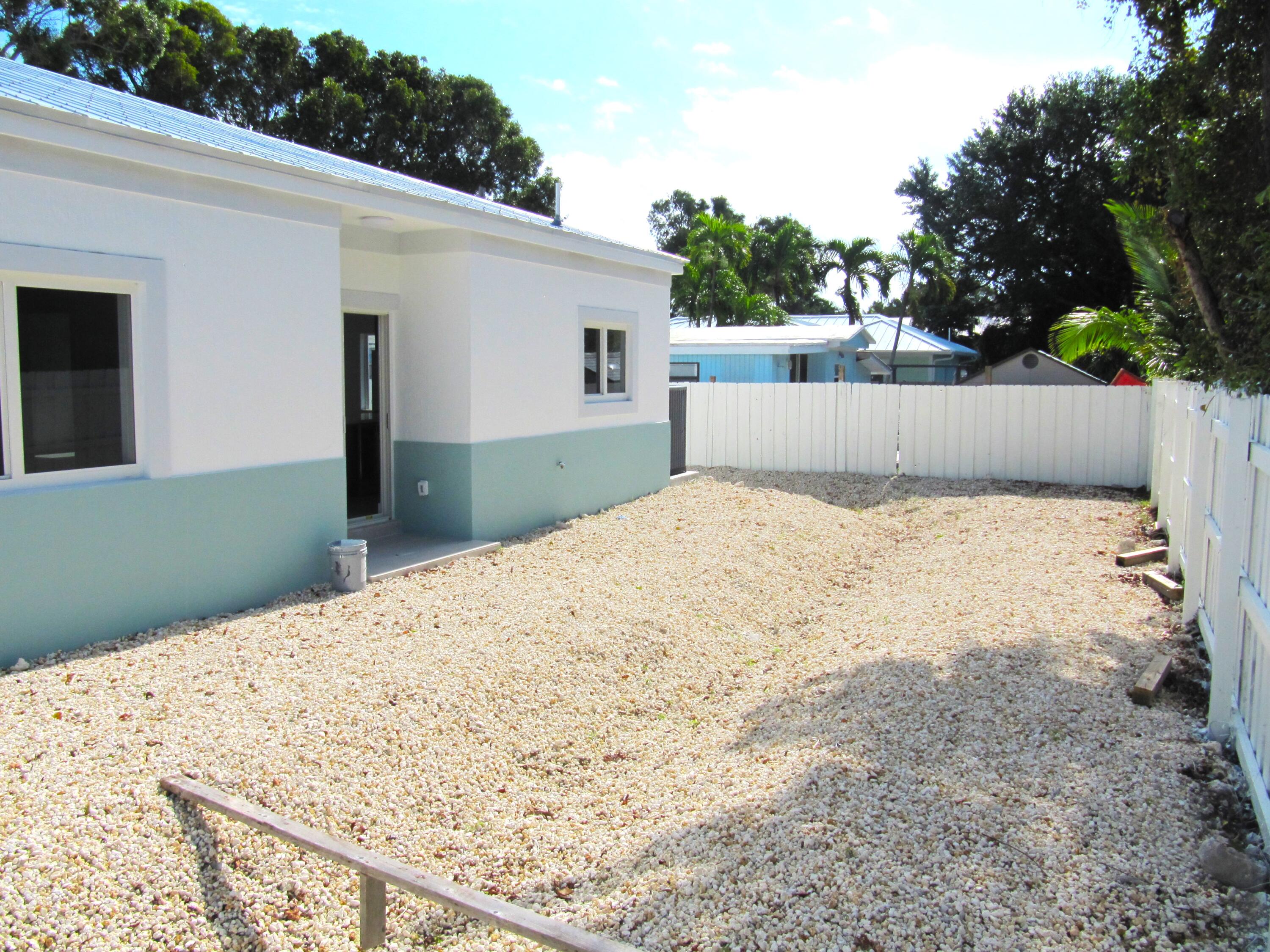 21 Tina Place Key Largo, FL 33037 - Photo 15 of 15 a view of wooden floor and a fence
