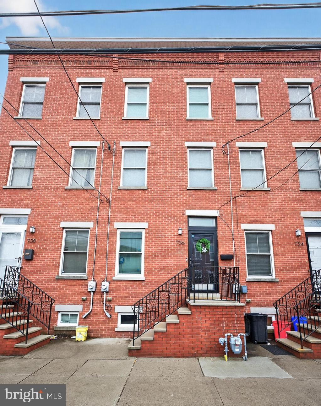 736 New Street Camden, NJ 08103 - Photo 1 of 20 a red brick building that has lot of windows on it