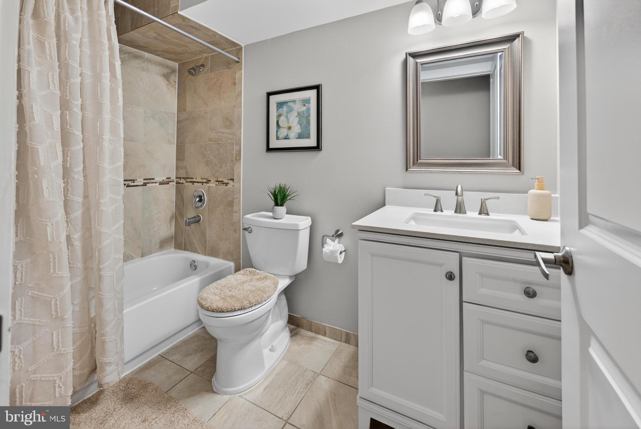 736 New Street Camden, NJ 08103 - Photo 12 of 20 a bathroom with a sink toilet and shower
