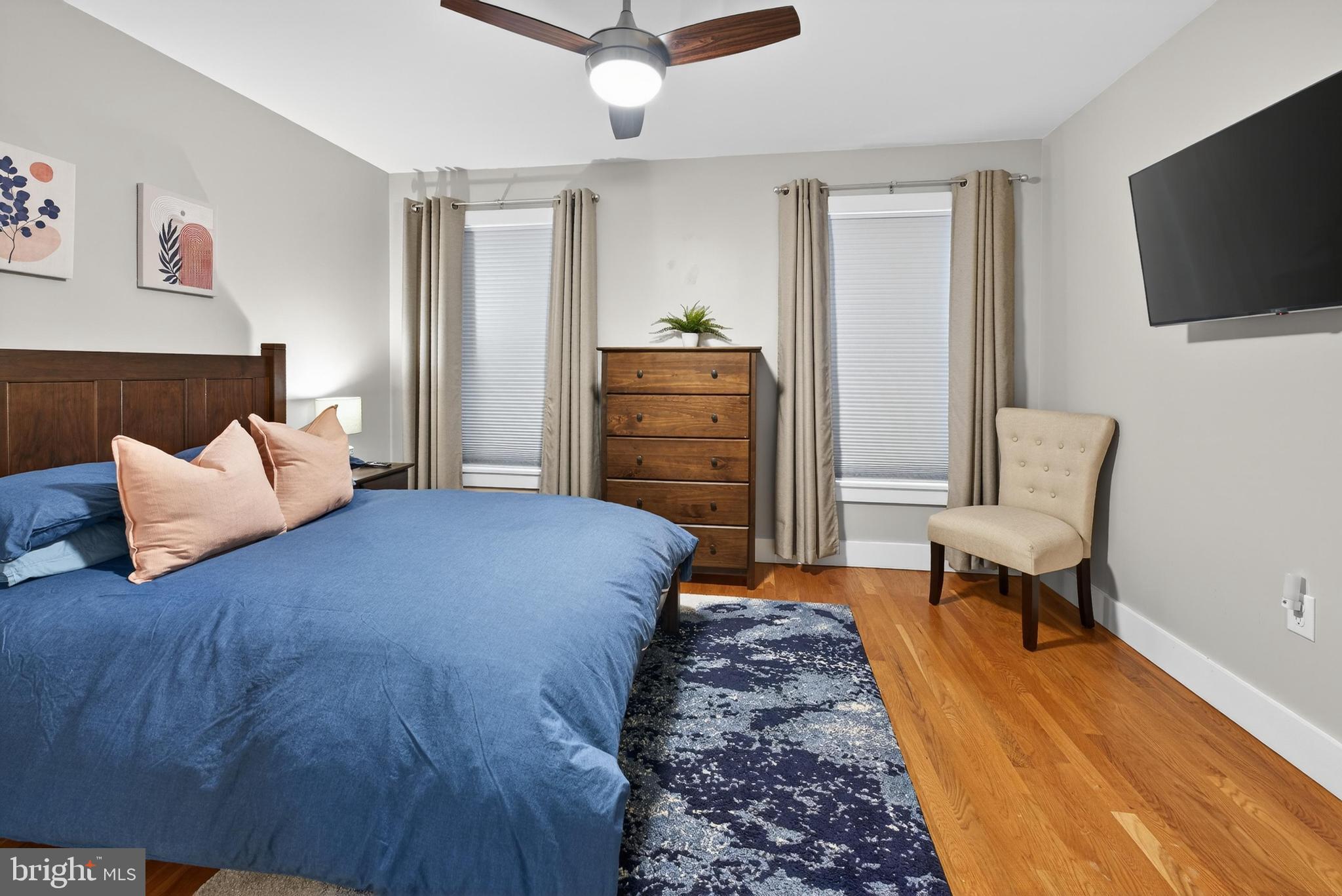 736 New Street Camden, NJ 08103 - Photo 14 of 20 a bedroom with furniture and a flat screen tv