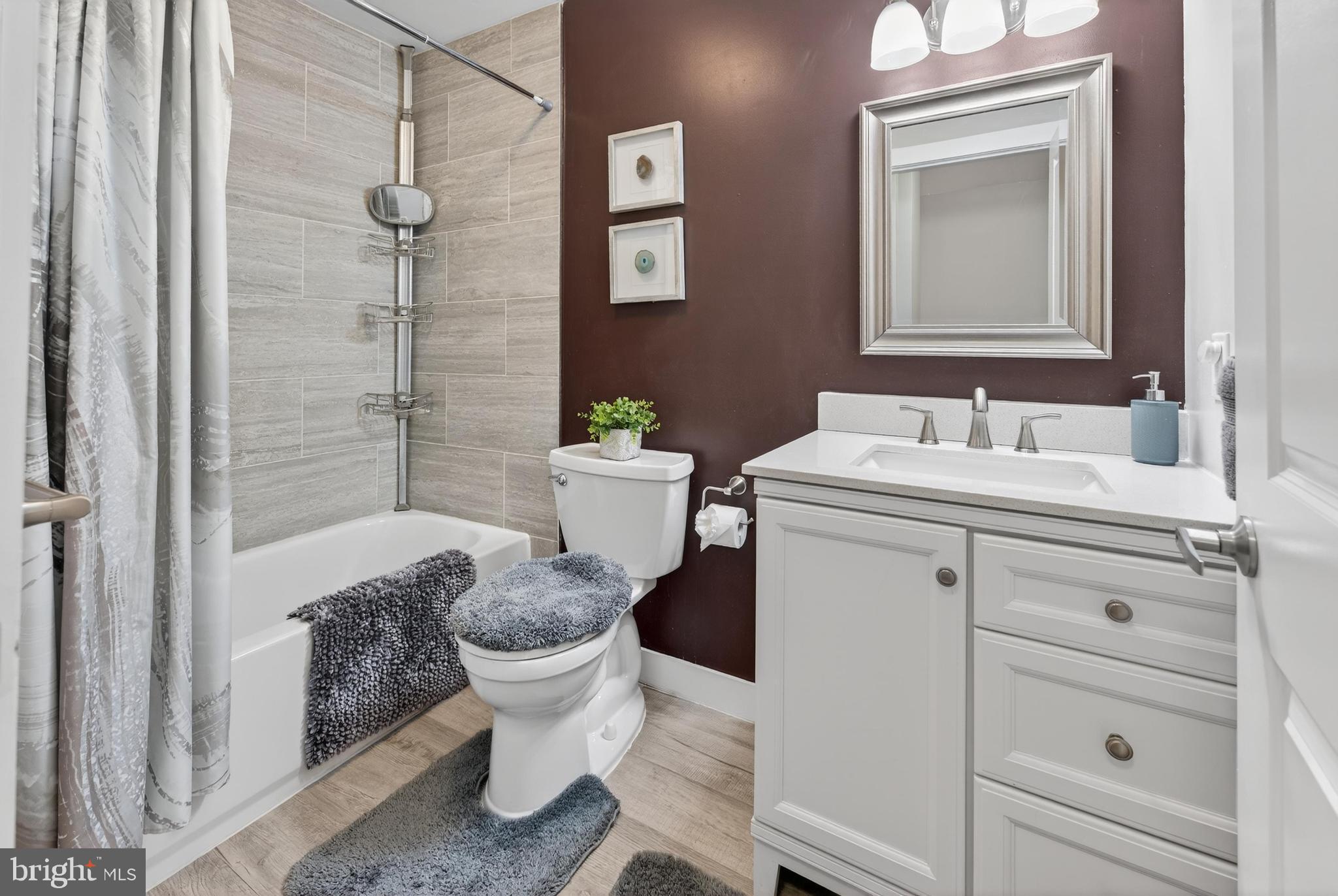 736 New Street Camden, NJ 08103 - Photo 16 of 20 a bathroom with a sink toilet and shower