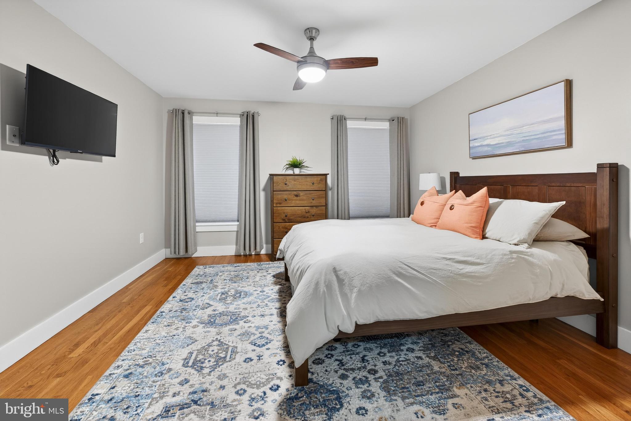 736 New Street Camden, NJ 08103 - Photo 17 of 20 a bedroom with a bed and a flat screen tv