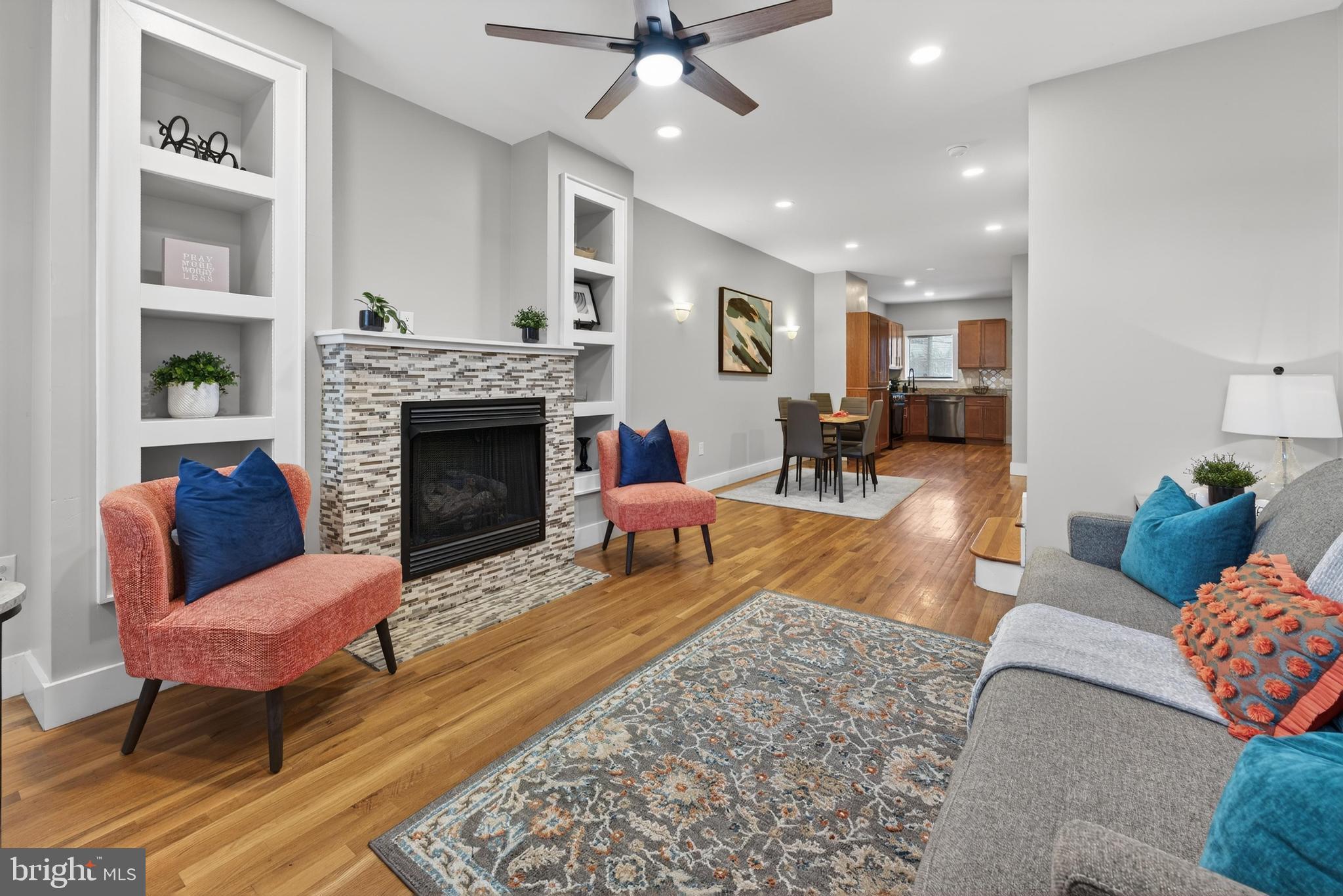 736 New Street Camden, NJ 08103 - Photo 2 of 20 a living room with furniture and a fireplace