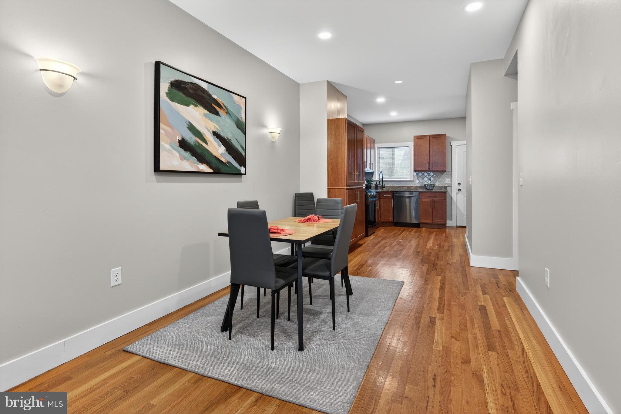 736 New Street Camden, NJ 08103 - Photo 5 of 20 a dining room with furniture and wooden floor