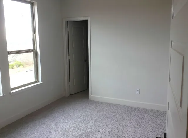an empty room with a window