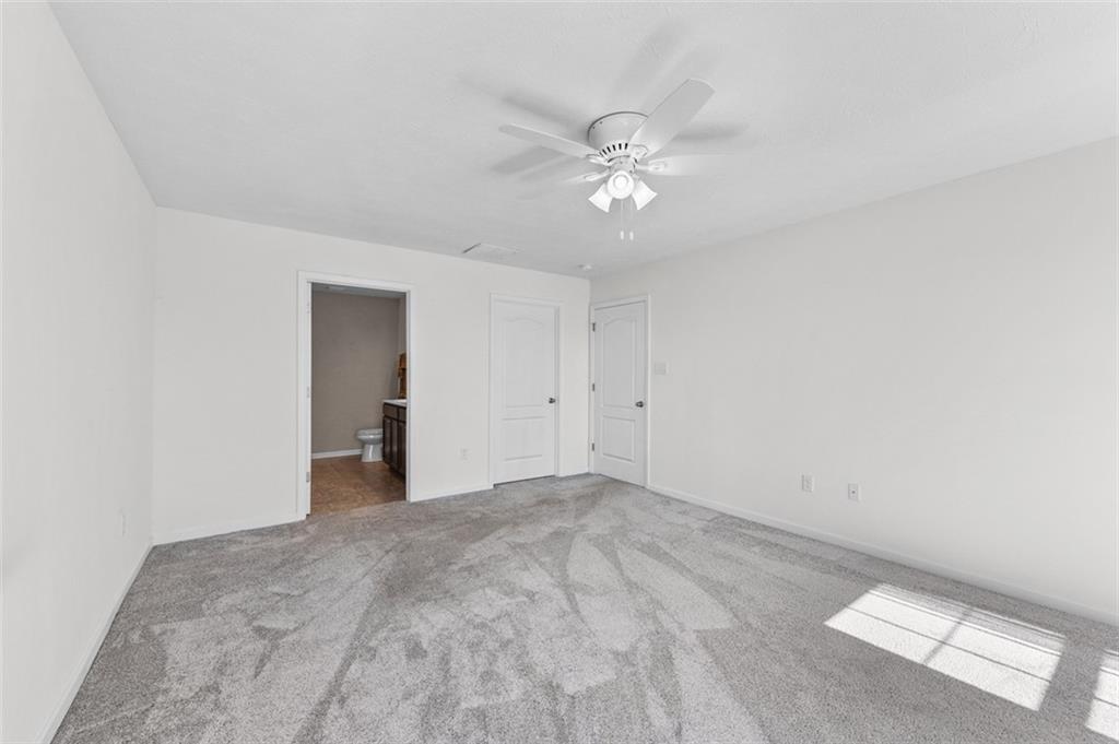 1024 Colonial Drive Uniontown, PA 15401 - Photo 15 of 33 a view of a big room with a ceiling fan