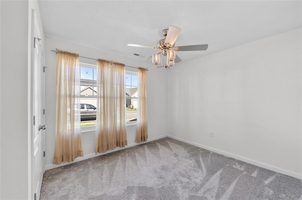 1024 Colonial Drive Uniontown, PA 15401 - Photo 21 of 33 an empty room with windows and closet