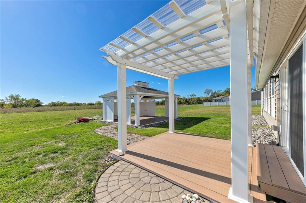 1024 Colonial Drive Uniontown, PA 15401 - Photo 26 of 33 a view of a deck with a big yard potted plants and large tree